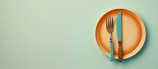 Aufkleber - Top-down view of ceramic tableware including a plate with a fork on a plain background with space for text or other images. Copy space image. Place for adding text and design