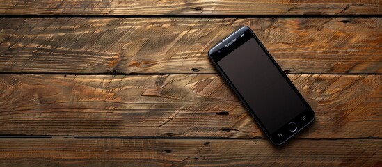 Poster - Smartphone placed on a wooden surface with copy space image.