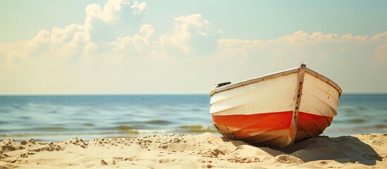 Sticker - Close-up view of a boat on sand with copy space image.