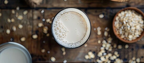 Aufkleber - Oat flakes milk is a vegan non-dairy alternative with a creamy texture. Copy space image. Place for adding text and design