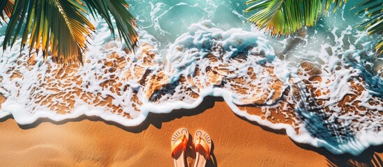 Leinwandbilder - Summer vibes with flip flops, evoking beach days and relaxation. Copy space image. Place for adding text and design