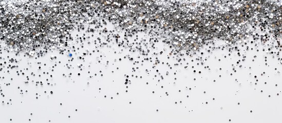 Leinwandbilder - Top view of silver glitter on a white background with copy space image.