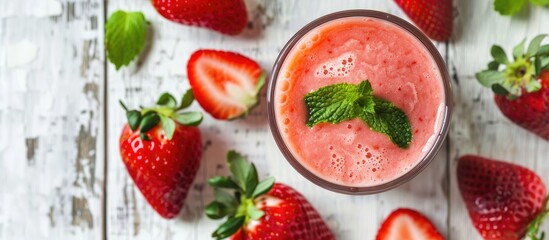 Poster - Strawberry fruit smoothie placed on a white wooden table, with a clear area perfect for adding text or graphics known as a copy space image.