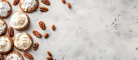 Fototapete - Cookies with nuts and white icing on a concrete background, with space for text or graphics. Copy space image. Place for adding text and design