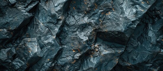 Poster - A background displaying a textured black rock, perfect for showcasing copy space image.