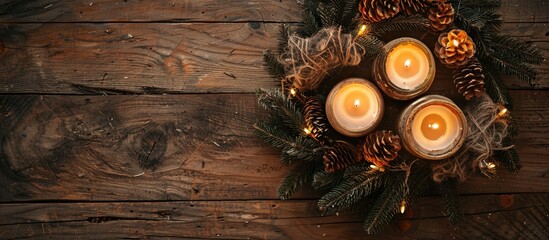 Aufkleber - Top view of an advent wreath with two lit candles atop an antique wooden table, creating a cozy ambiance in the copy space image.