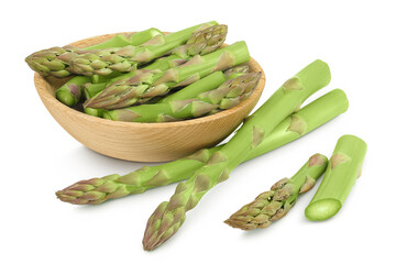 Wall Mural - fresh asparagus in wooden bowl isolated on white background