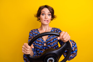 Wall Mural - Portrait of young lady wear stylish summer blouse hold steering wheel bite lips and accident car crash isolated on yellow color background