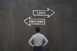 © Song_about_summer - Logic vs emotions, logical choice versus emotional, business man looking at arrows