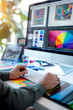 © Alexey - Side view of a graphic designer working in a modern open space office. Profession concept.