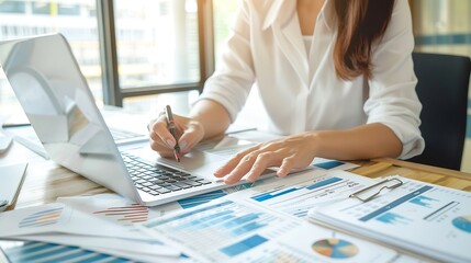 latin american businesswoman working inside office with documents and laptop worker paperwork calcul