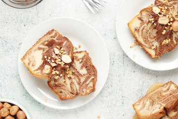 Wall Mural - A piece of marble biscuit with chocolate cream and nuts