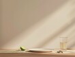 © Daniil - A Glass of Water and a Lime on a White Plate in a Sunlit Room
