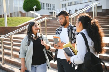 Wall Mural - Cheerful Indian asian young group of college students or friends together