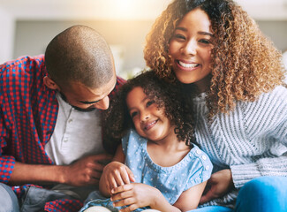 Sticker - Happy family, portrait and laugh relaxing together with sofa, support and bonding in home. Man, woman and parents with excited daughter and smile on couch in house living room for weekend care