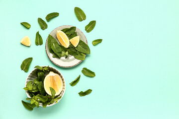Wall Mural - Composition with fresh mint leaves and lemons on color background