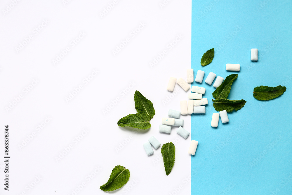 Fresh chewing gums with mint on colorful background