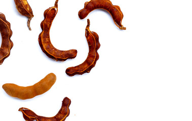 Sticker - Tamarind fruit on white background.