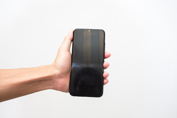 Man's hand holding a smart phone screen view from above. isolated in white background