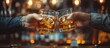 © GoDress - Close up view of two men's hands clinking whiskey glasses of alcoholic drink together while at bar counter