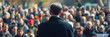 © john - A politician addresses an attentive crowd from a podium