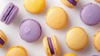 © pornsawan - Purple and lemon french Macaroon on color background,multicolored tasty french macaroons,Pastry, bakery and branding concept,copy space.