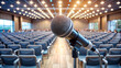 © Alon - Conference hall background with microphone  small business training and public speaking.