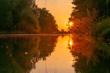 calm water on the river on a beautiful evening at sunset calm and zen