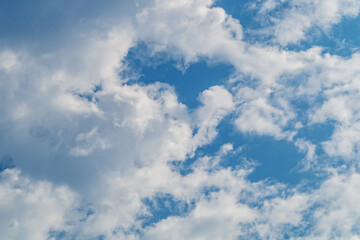 Wall Mural - white clouds almost completely covered the blue of the clear sky. background for art blanks, wallpap