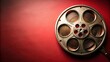 © Sujid - Close-up of vintage film reel on red background, film, vintage, reel, red, background, close-up, photography, cinematography