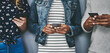 © peopleimages.com - Hands, phone and group of friends on social media, email or web connectivity with online web search. Scroll, smartphone or people typing on mobile app together for chat, networking or internet post