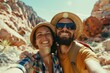 © Alexander Chaykin - A couple posing for a selfie in the desert, with sand dunes and cacti in the background