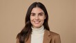 © buddhika - young woman with dark straight long hair and a confident smile wearing a white turtleneck top and a brown blazer