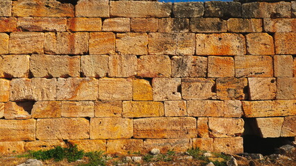 Ancient Sandstone Brick Wall Warm Tones Close-Up