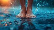 © asayenka - A close-up photograph capturing bare feet standing on a wet surface with dynamic water droplets splashing around