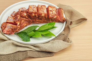 Wall Mural - Marinated raw ribs with spices and herbs. Traditional ingredient for BBQ, picnic concept