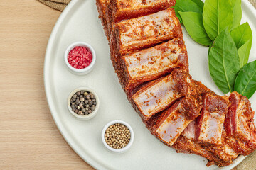 Wall Mural - Marinated raw ribs with spices and herbs. Traditional ingredient for BBQ, picnic concept