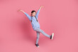 © deagreez - Full body portrait of cute little schoolkid dancing wear hoodie isolated on pink color background