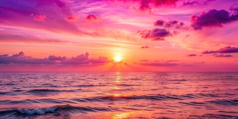 Wall Mural - Pink sunset over the ocean, with the sky and sea turning a beautiful shade of pink, pink, sky, sea, sunset, ocean
