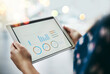 © peopleimages.com - Hands, data analysis and woman with tablet, screen and statistics for online investment report. Charts, graphs and person on digital app for business growth, development and erp metrics for profit