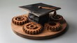 © Wahyu - Graduation Cap on Wooden Gears Symbolizing Education and Industry
