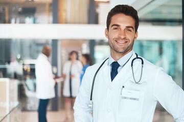 Poster - Doctor, face and confidence in hospital for healthcare, wellness or medical experience with stethoscope. Man, portrait and smile as surgeon in health facility with pride for cardiology or medicine