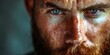 © inspiretta - A man with a beard and blue eyes. He has a serious look on his face