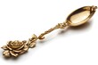 © Valentin - Ornate Gold Spoon with Intricate Rose Design