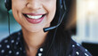 © peopleimages.com - Girl, office and mouth in call center for telemarketing, consulting and outbound customer support for sales. Woman, consultant and headphones for communication, listening and contact us for advice.