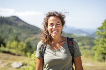 Sticker - Portrait of a happy woman in her 30s sporting a breathable hiking shirt on quiet countryside landscape