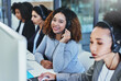 © peopleimages.com - Girl, office and portrait in call center for customer support, consulting and outbound telemarketing for sales. Woman, happy and headphones for communication, listening and contact us for advice.