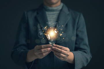 Poster - Glowing light bulb in hand, idea search concept Creativity from information trade in the internet world,education , business ideas and target groups.