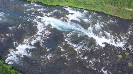 Wall Mural - Bruarfoss waterfall flowing from Bruara river on wilderness in summer at Iceland