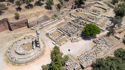 Wall Mural - Aerial bird's eye view photo taken by drone of archaeological site of ancient Delphi, site of temple of Apollo and the Oracle, Voiotia, Greece